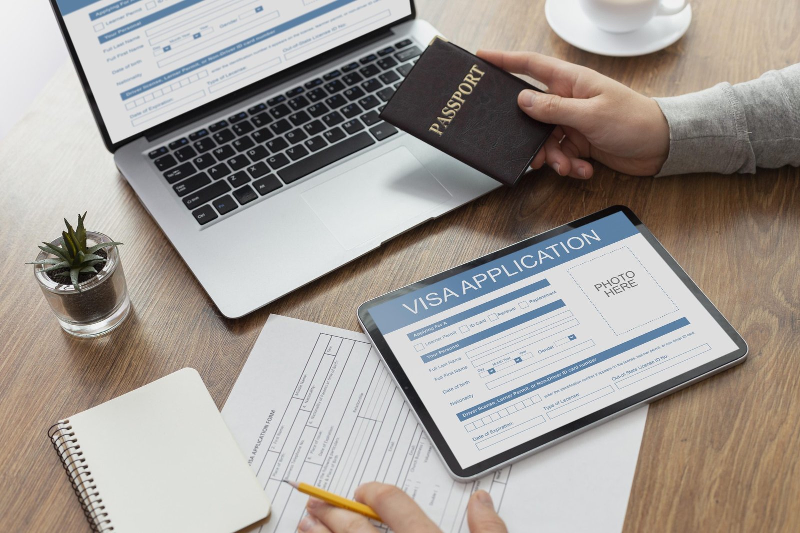 visa application form laptop tablet